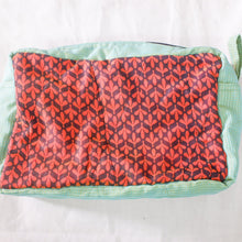 Load image into Gallery viewer, Rectangular pouch with red and black pattern on a white background