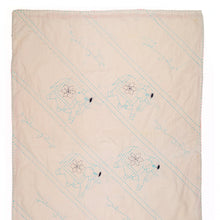Load image into Gallery viewer, Beige quilt with embroidered patterns on a white background