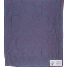 Load image into Gallery viewer, Purple fabric with embroidered designs on a white background