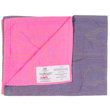 Load image into Gallery viewer, Pink and purple quilt with visible brand label on a white background