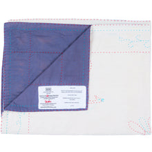 Load image into Gallery viewer, Quilted fabric with purple corner and visible stitching on a white background
