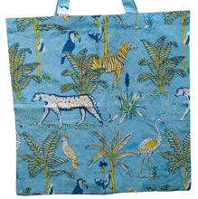Load image into Gallery viewer, Tote bag with jungle animal pattern on a blue background