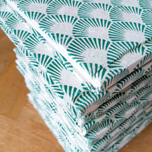 Load image into Gallery viewer, stack of recycled paper notebooks on wooden surface