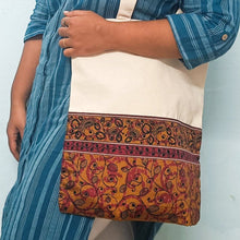 Load image into Gallery viewer, model with half sari tote bag