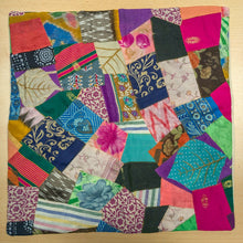 Load image into Gallery viewer, Handmade Patchwork Sari Cushion Cover placed on a wooden surface