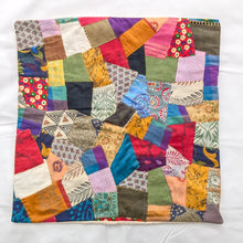 Load image into Gallery viewer, Colourful sari patchwork cushion cover laying flat on a white surface