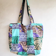 Load image into Gallery viewer, Colorful patterned tote bag on a plain background