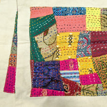 Load image into Gallery viewer, zoomed in on pile of sari patchwork tote bags with kantha stitching on a light wooden surface