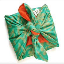 Load image into Gallery viewer, gift wrapped in green and orange sari gift wrap on a white surface