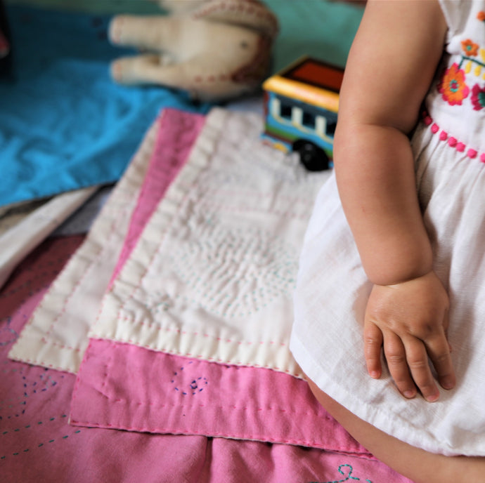 Embroidered with empowerment, from mother to mother