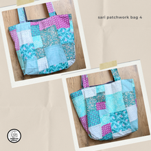 Load image into Gallery viewer, Sari patchwork bag with colorful patterns on a wooden surface
