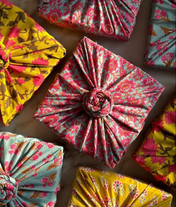 Gifts wrapped in upcycled sari gift wrap