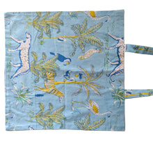 Load image into Gallery viewer, Fabric bag with animal and plant pattern on a beige background

