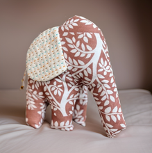 Load image into Gallery viewer, Fabric elephant with leaf pattern on a neutral background
