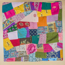 Load image into Gallery viewer, Handmade Patchwork Sari Cushion Cover placed on a wooden surface
