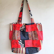 Load image into Gallery viewer, Multicolored patchwork tote bag on a white background
