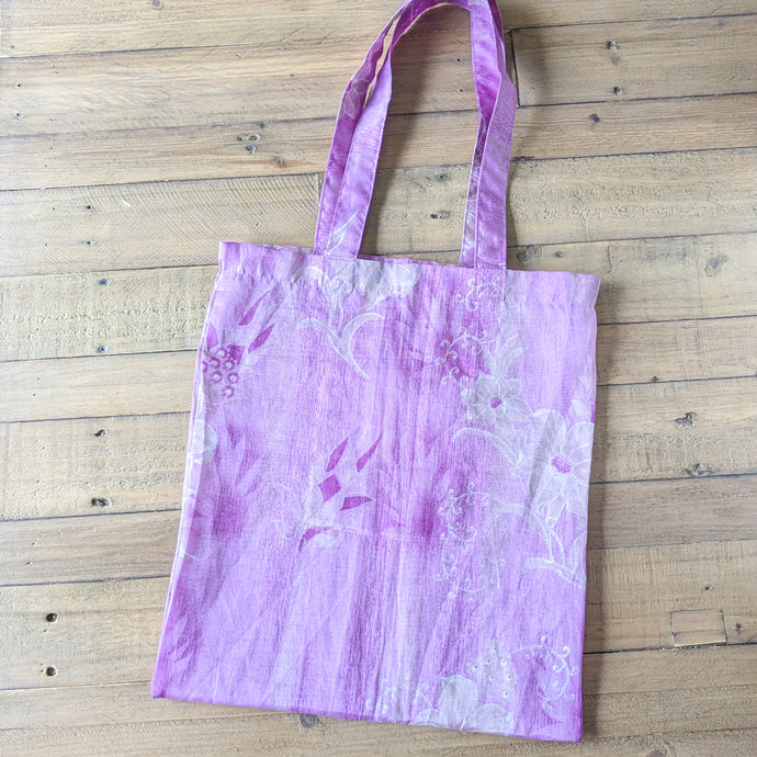 pink sari tote bag on wooden background