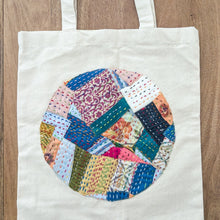 Load image into Gallery viewer, Sari patchwork cotton tote bag against wooden background
