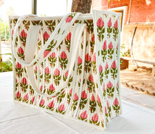 Load image into Gallery viewer, Large quilted weekend tote bag, vibrant pink block print, floral design
