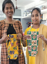 Load image into Gallery viewer, artisans smiling and holding reusable cotton drawstring bags
