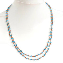 Load image into Gallery viewer, Handmade glass beaded necklace with copper wire, light blue beads
